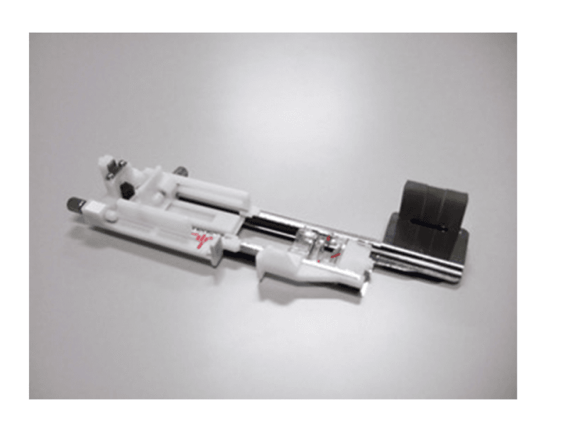 Janomen Knapphullsfot lang inkl stabiliseringsplate (15000)